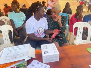 Tikila Ademun demonstrates how to use a female condom
